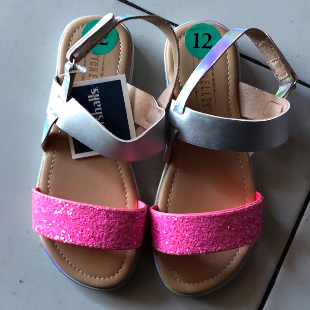 Brand new hot pink and silver. Size 12
